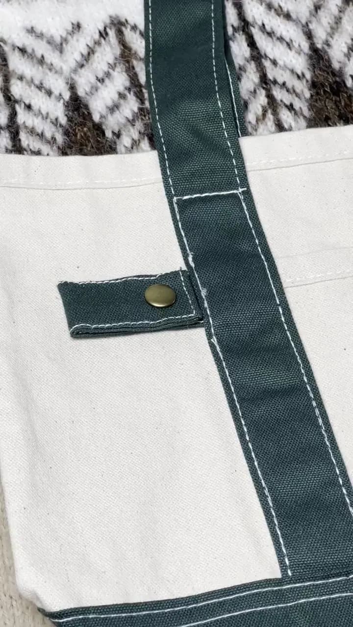 Video del bolso M crudo verde de lona