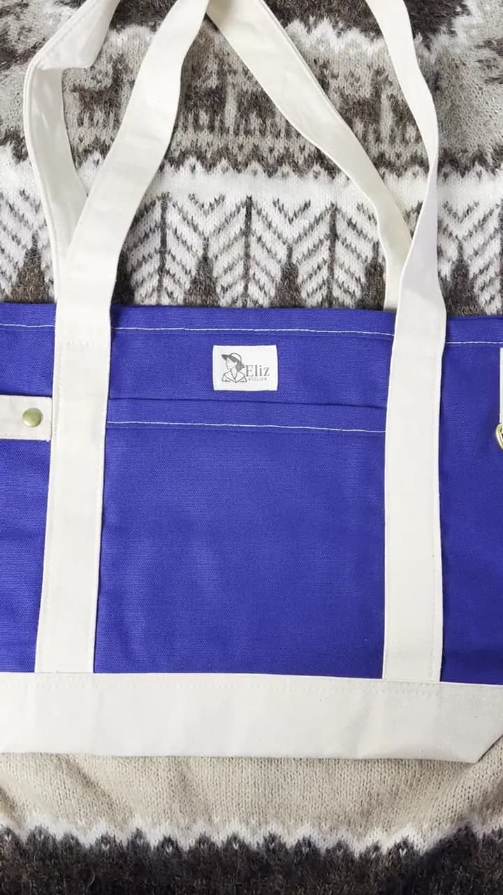 Video del bolso M azul rey de lona